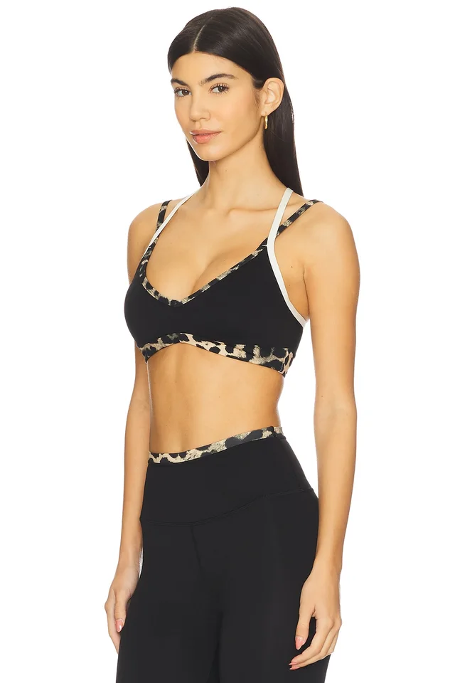 P.E Nation x REVOLVE Paramount Sports Bra in Black & Leopard, photo 2 of 4 from REVOLVE (Canada)
