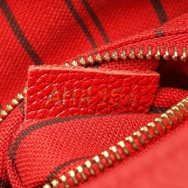 Louis Vuitton Monogram Empreinte Speedy Bandoulière 25 Bag in Leather from A Retro Tale, photo 8 of 9