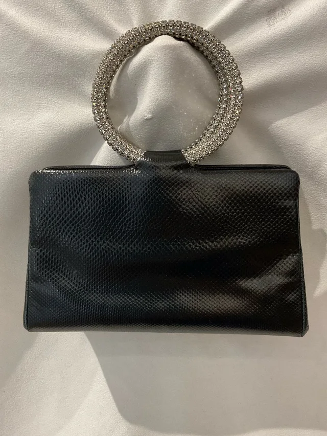 Judith Leiber handbags in black Lizard from Poshmark