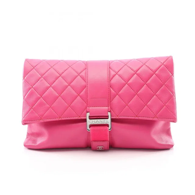 Chanel Clutch Quilted Fuchsia Pink Lambskin in Pink Lambskin from The Reluxe
