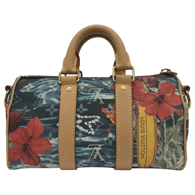 Louis Vuitton Keepall Bandouliere 25 Surfing Monogram Navy Blue in Navy Coated canvas from The Reluxe