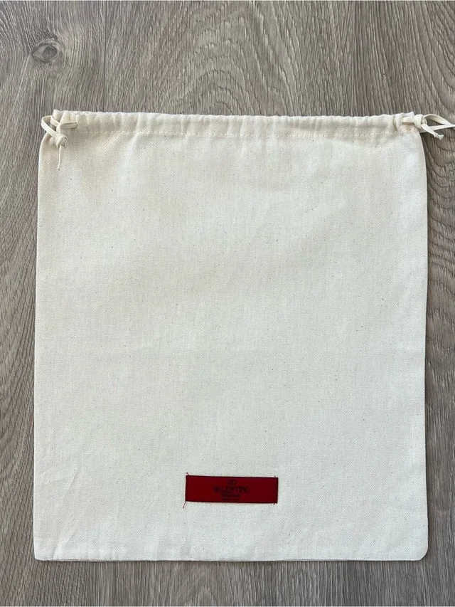 Valentino Garavani Dust Bag (C101) in yellow from Poshmark