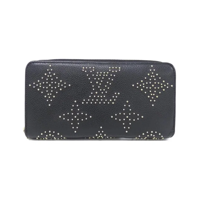 Louis Vuitton Monogram Empreinte Zippy Wallet from The Reluxe