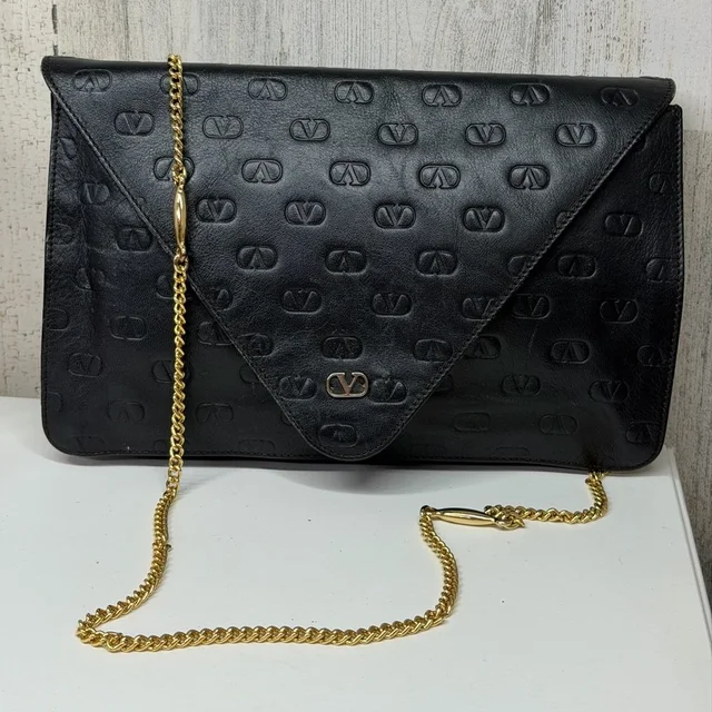 Valentino Garavani Vintage Leather Vlogo Crossbody Clutch Bag in black|gold Leather from Poshmark
