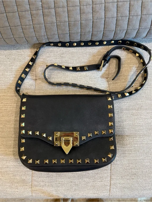 Valentino Garavani Black Leather Crossbody With Gold Pyramid Studs in black|gold Leather from Poshmark