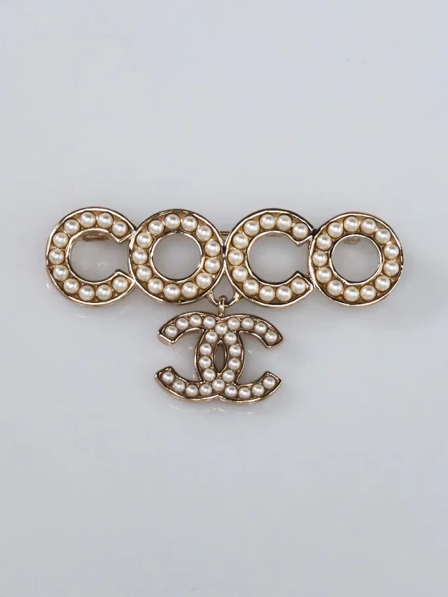 Chanel Goldtone Metal and Faux Pearl Coco Brooch from Yoogis