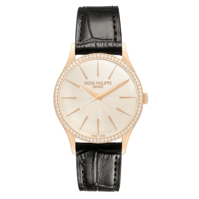 Patek Philippe Calatrava (Reference 4897R-010). A 33mm rose gold diamond-set manual wind wristwatch. 2013 from Sotheby's