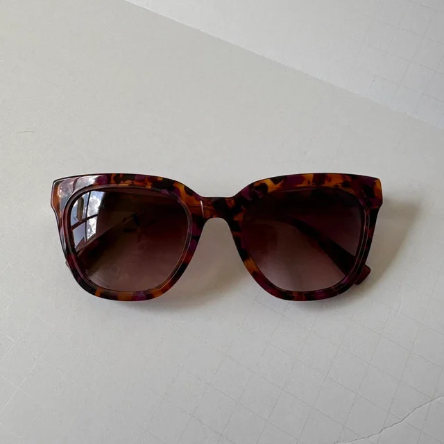 Stella McCartney Women's Sunglasses - Brown/Purple in brown|red|purple from Depop, photo 1 of 1