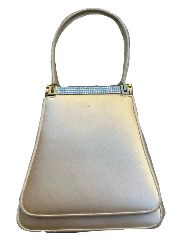 Judith Leiber Crystal-Embellished Top-Handle Clutch in gold from Poshmark, photo 1 of 1
