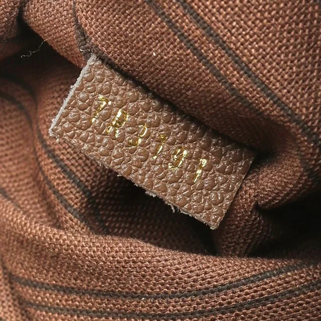 Louis Vuitton Empreinte Artsy MM Bag in Canvas from A Retro Tale, photo 13 of 14