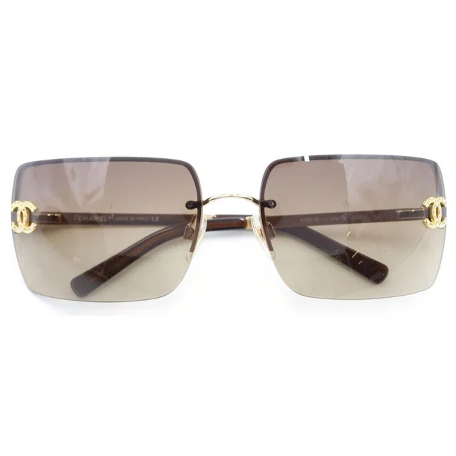 Chanel CC Logo Sunglasses Rimless Brown Gold Eyewear in Brown from The Reluxe