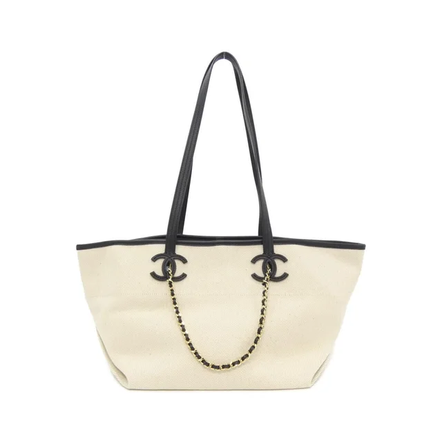 Chanel Bag Handbag Ivory in White Canvas from The Reluxe