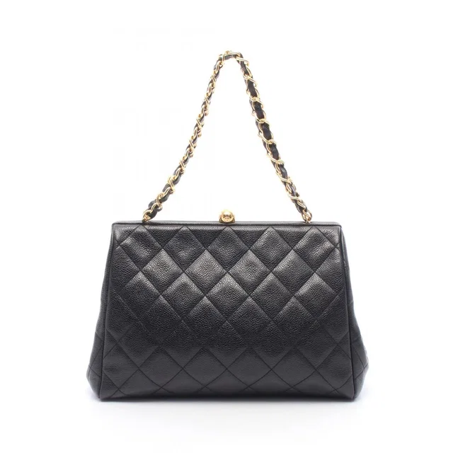 Chanel Handbag Quilted Black Caviar Leather Kiss Lock Chain in Black Caviar leather from The Reluxe
