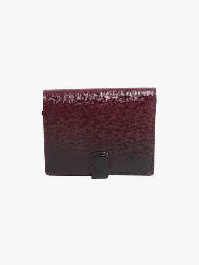 Delvaux Burgundy ombre Léonce Compact wallet in Burgundy Goatskin from Sign of the Times