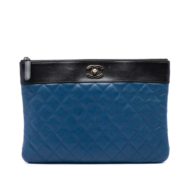 Blue Chanel Medium Bicolor Quilted Sheepskin Mademoiselle O Case Clutch in Blue Leather from Designer Revival