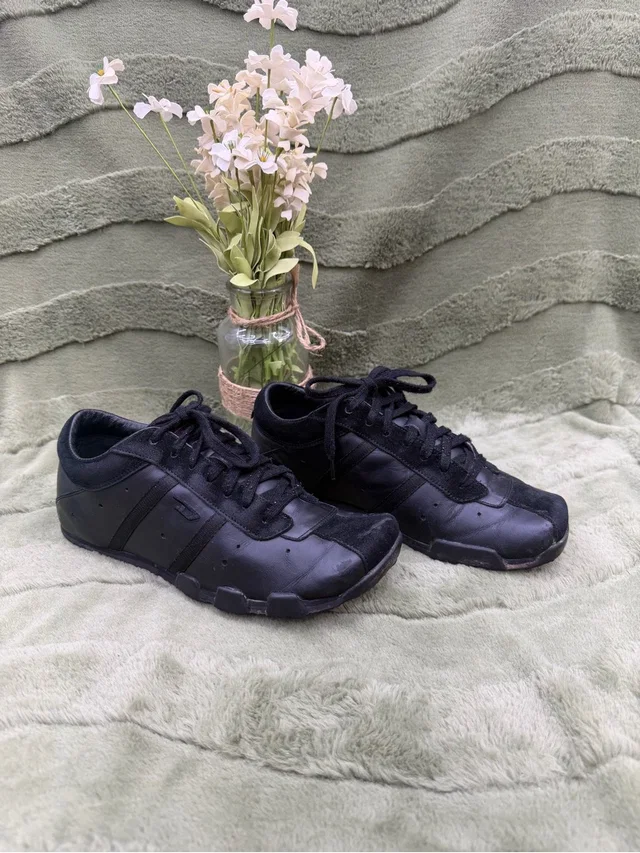 Diesel sneakers & athletic in black Leather from Poshmark
