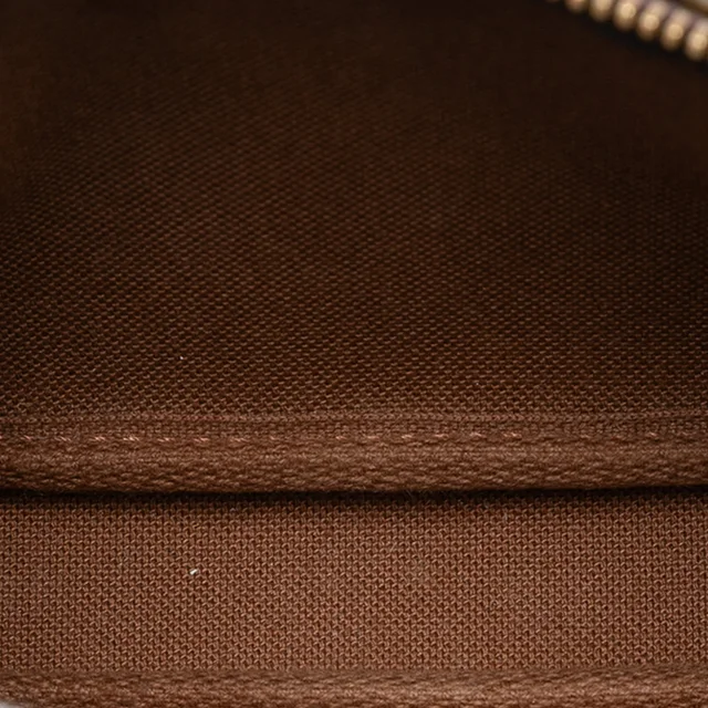 Brown Louis Vuitton Monogram Mini Pochette Accessoires Handbag in Brown Coated canvas from Designer Revival, photo 2 of 2