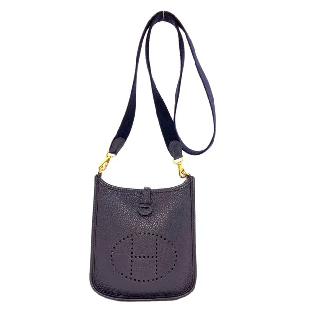 Hermès Evelyne TPM Gold Shoulder Bag Taurillon in Gold from The Reluxe