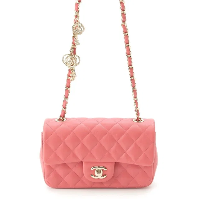 Chanel Mini Quilted 20 Lambskin Charm Chain Shoulder Bag Pink in Pink Lambskin from The Reluxe