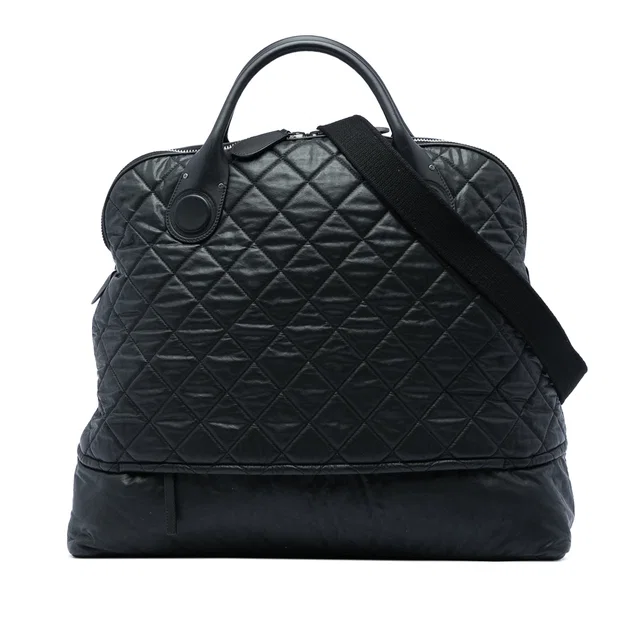 Black Chanel Extra Large Quilted Coated Canvas Expandable Zip Travel Bag in Black Coated canvas from Designer Revival