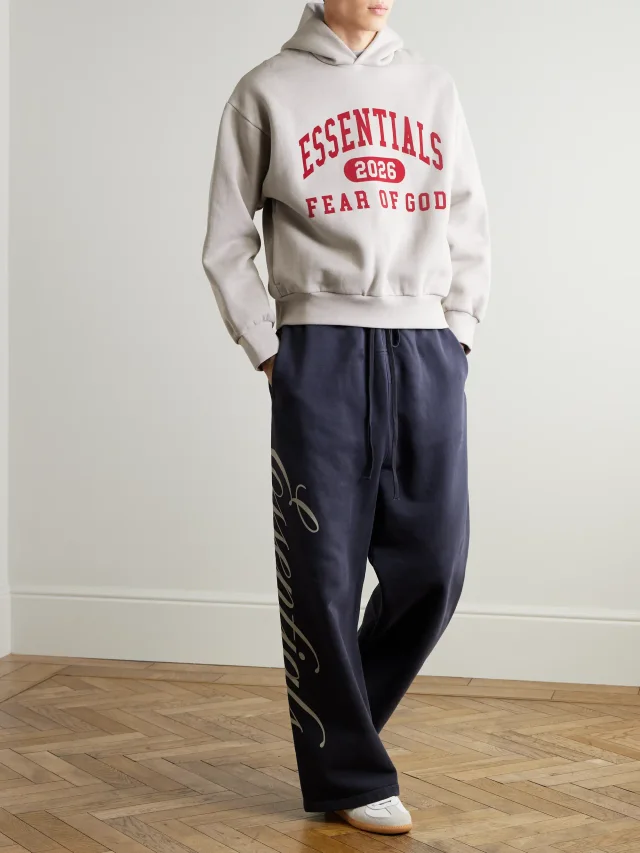 FEAR OF GOD ESSENTIALS Logo-Print Cotton-Blend Jersey Hoodie $135 50% off $68 in Grey, photo 2 of 2 from MR PORTER