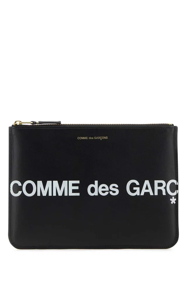 Comme des Garçons Logo-Print Leather Clutch — Black Exterior: Wallet in Black Leather from HEWI