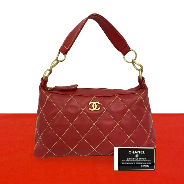 Chanel CC Logo Wild Stitch Lambskin Handbag in Lambskin from The Reluxe