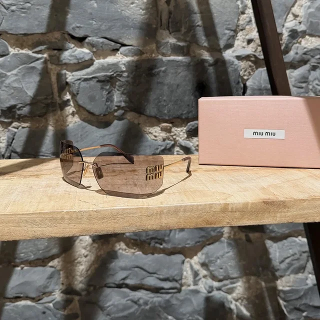 Miu Miu Smu 54yu Logo Brown Shield Aube Sunglasses in red|brown from Grailed
