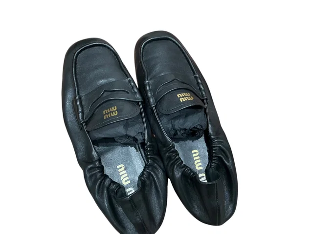 Miu Miu Black Leather Logo Loafers #38 in Black Leather from Luxury Promise