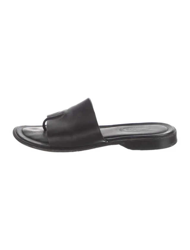 Tod's Leather Slides in black Leather from The RealReal