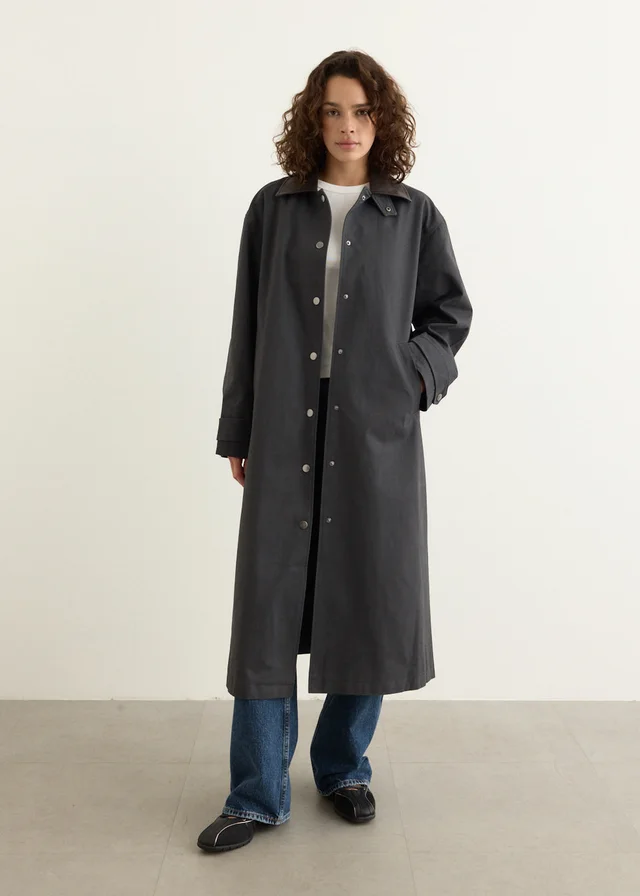 Incu Collection Duster Country Coat in Black from Incu, photo 1 of 1