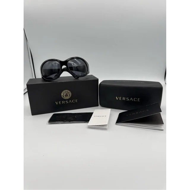 Versace Women's Sunglasses - Black in black from Depop, photo 1 of 1
