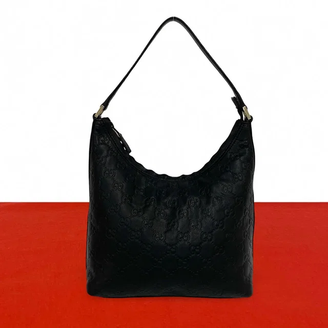 Gucci Guccissima GG Log Pattern Leather Shoulder Bag Mini Tote Black in Black Leather from The Reluxe