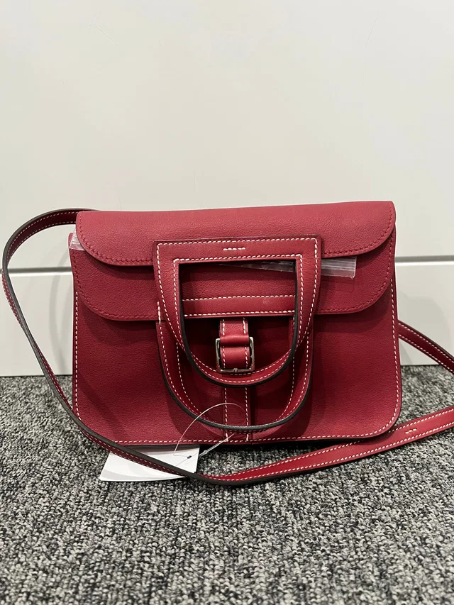 Hermès Swift Rouge Vif SV Halzan Mini in Red Swift leather from Luxury Promise
