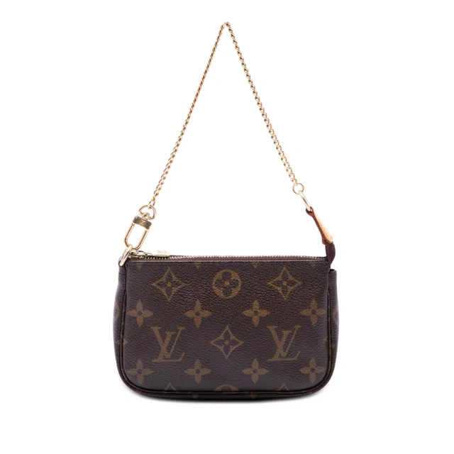 Brown Louis Vuitton Monogram Mini Pochette Accessoires Handbag in Brown Coated canvas from Designer Revival, photo 1 of 1