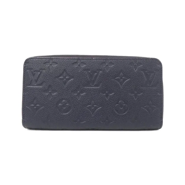 Louis Vuitton Monogram Empreinte Zippy Wallet from The Reluxe