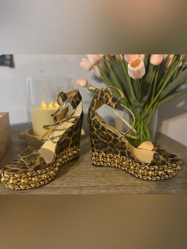 Christian Louboutin Leopard Print Wedge Sandals With Gold Accents in gold|brown|red from Poshmark