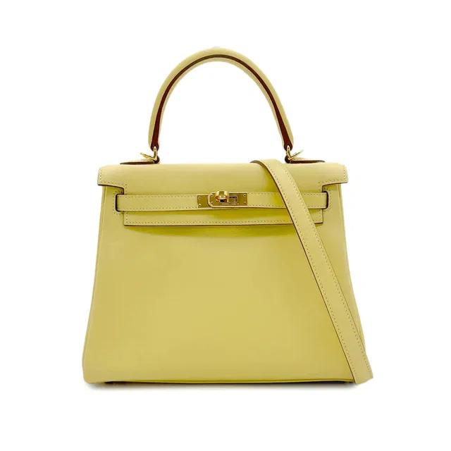 Hermès Kelly 25 Retourne Jaune Poussin Veau Swift Hand Shoulder Bag Z GHW 90303899 in Yellow Swift leather from Luxury Promise