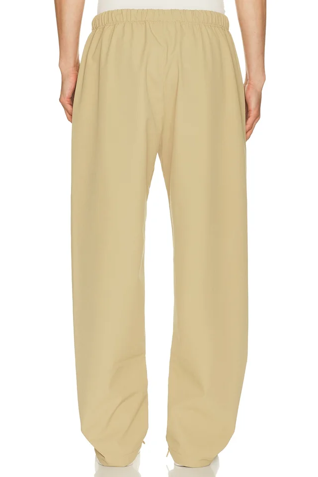 Fear of God ESSENTIALS Signature Track Pant in Dune, photo 3 of 6 from REVOLVE (Canada)