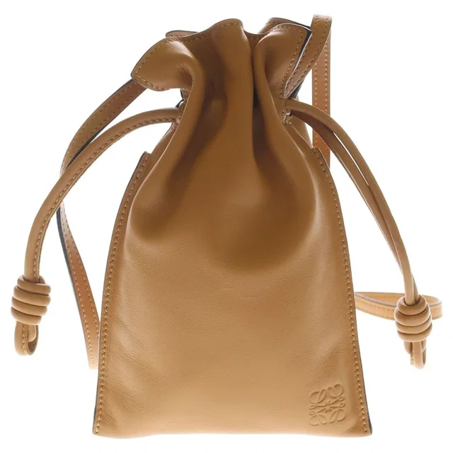 Loewe Flamenco Pocket Leather Logo Embossed Drawstring Bag Brown in Brown Leather from The Reluxe