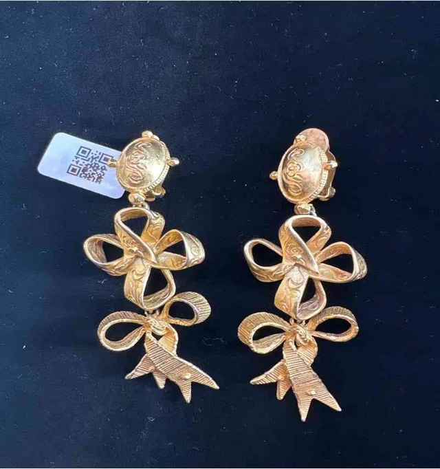 Christian Lacroix Gold Bow Ear Clip in Gold from Luxury Promise