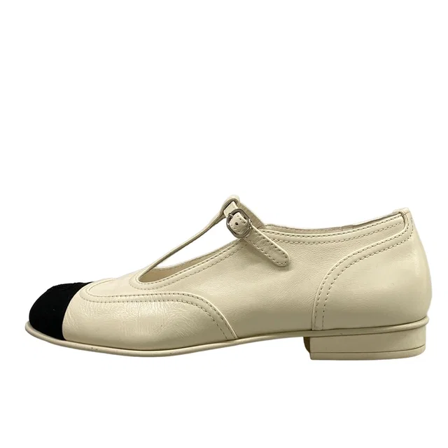 Chanel Shoes White Black CC Logo Leather in Black Leather from The Reluxe
