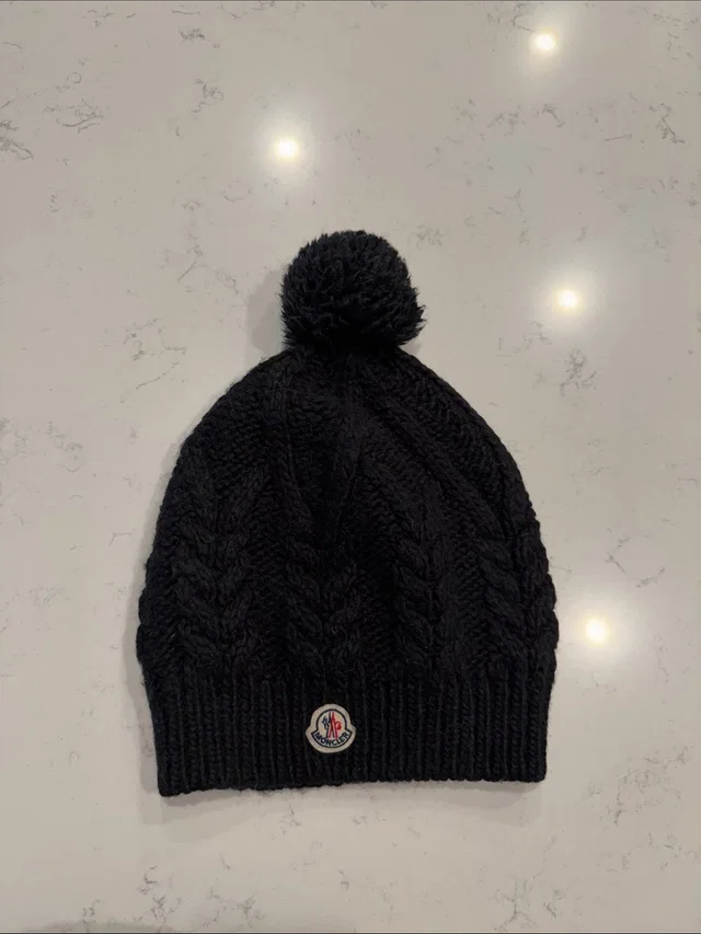Moncler Cable-Knit Pom Beanie in black from Poshmark