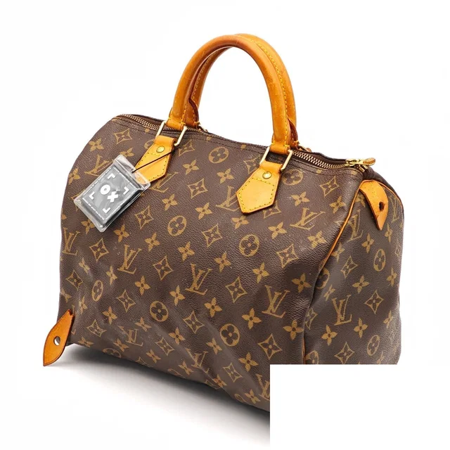 Louis Vuitton Speedy 30 Bag Handbag Brown in Brown Coated canvas from The Reluxe