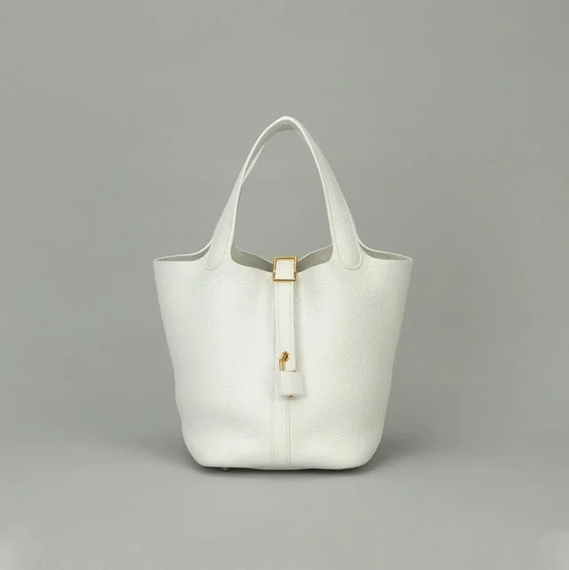 Hermès Picotin Lock PM 18 PM Tote Bag Taurillon Clemence White Gold in White Clemence leather from The Reluxe