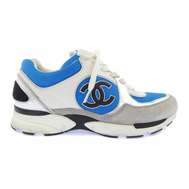 Chanel Sneakers White in White from The Reluxe