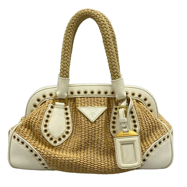 Prada Handbag Beige White Kiss Lock Leather Tag in White Leather from The Reluxe