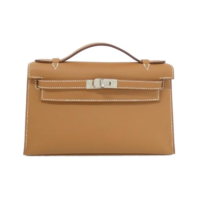 Hermès Pochette Kelly Mini Bag in Swift leather from The Reluxe
