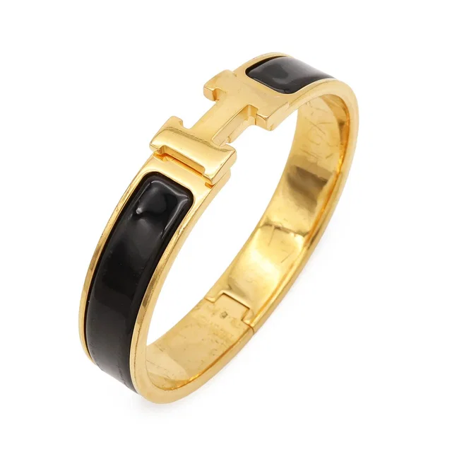 Hermès Clic H PM Ash Bracelet Bangle Enamel Gold Plated Black in Black from The Reluxe