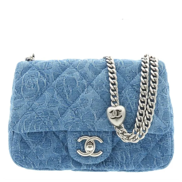 Chanel Shoulder Bag Flower Blue Silver Denim Leather Quilted Chain in Blue Denim from The Reluxe